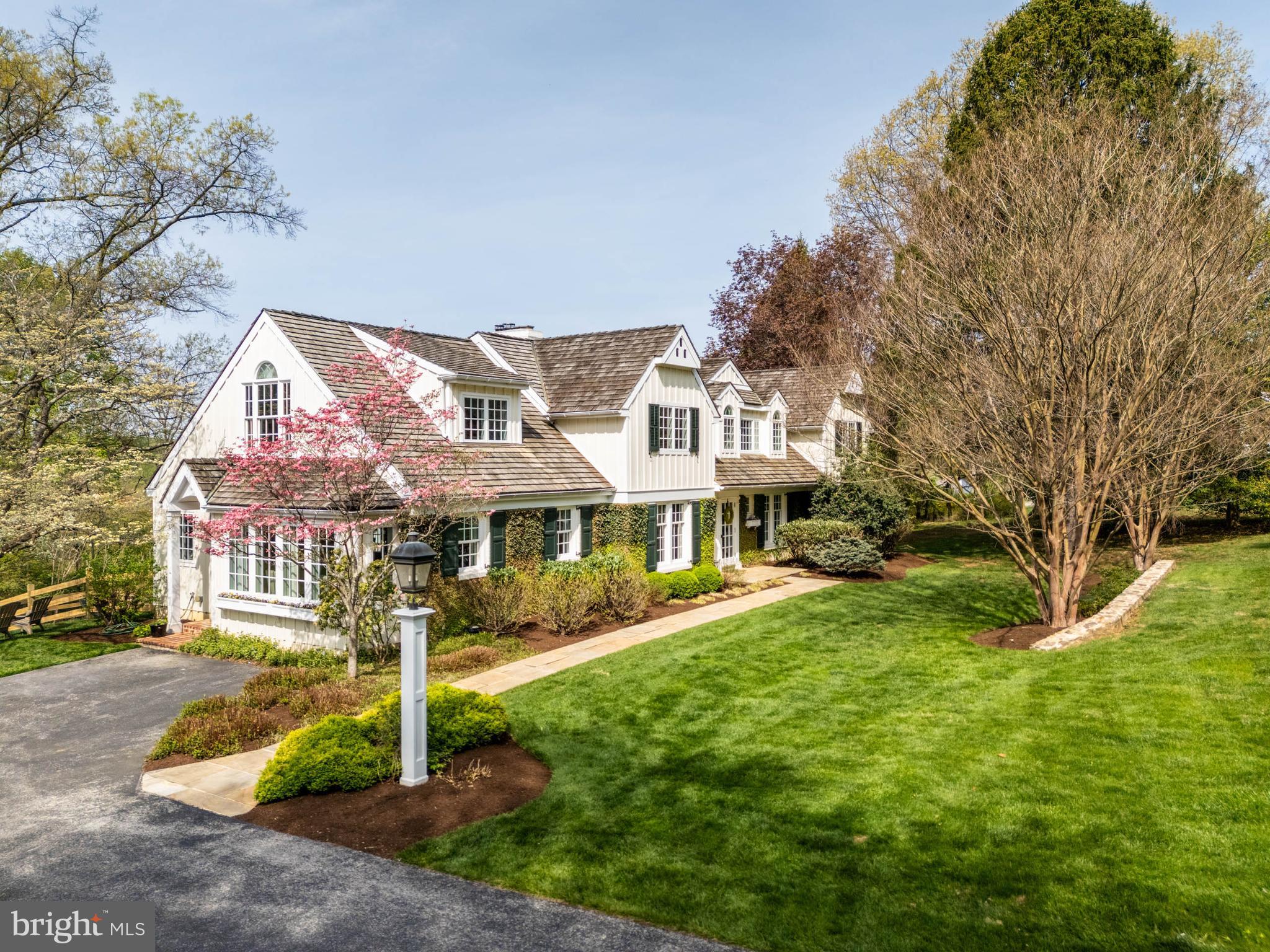 8 Rabbit Run Road Malvern, PA 19355 - Photo 3 of 49 a front view of a house with a yard