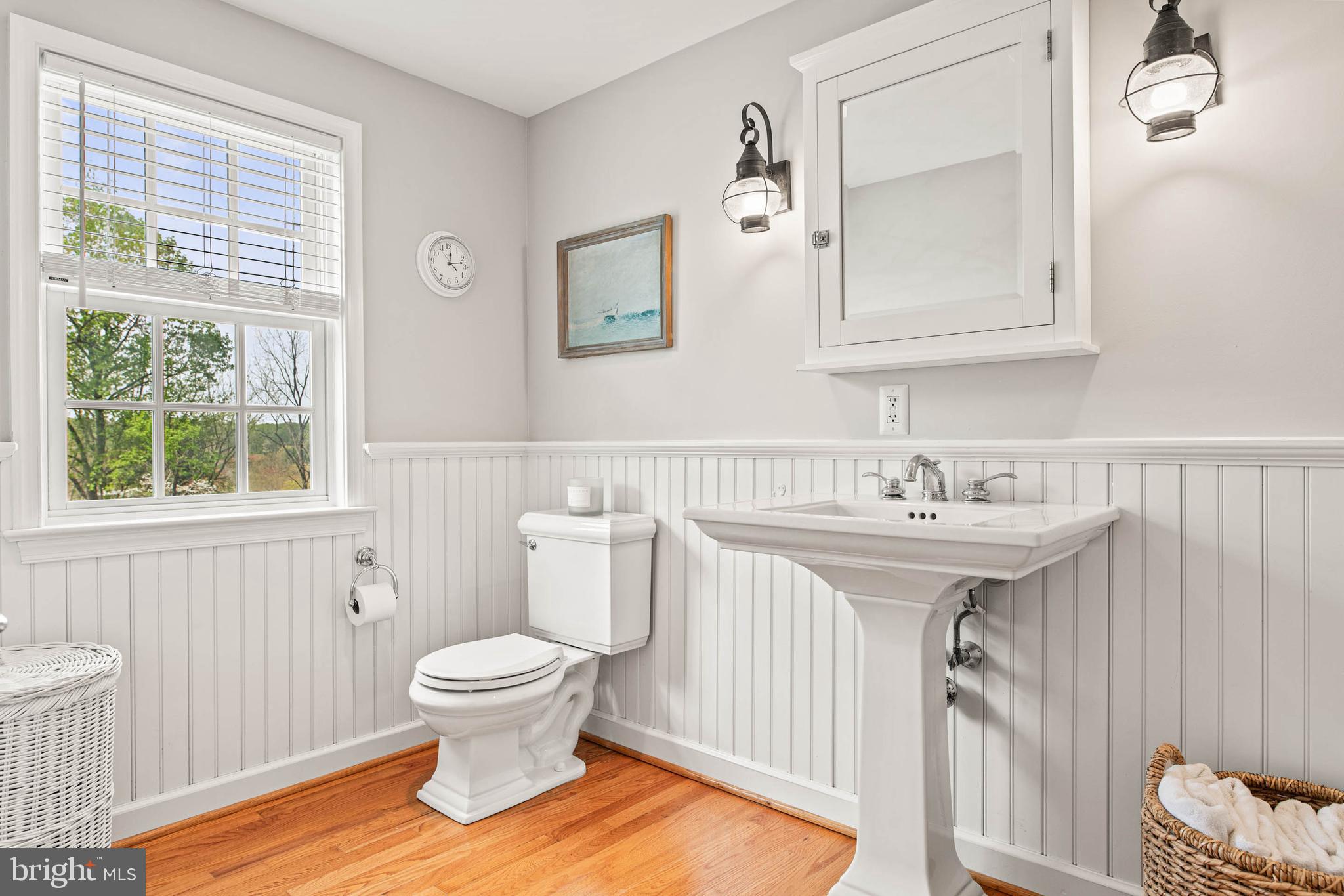 8 Rabbit Run Road Malvern, PA 19355 - Photo 32 of 49 a bathroom with a sink a toilet and a mirror