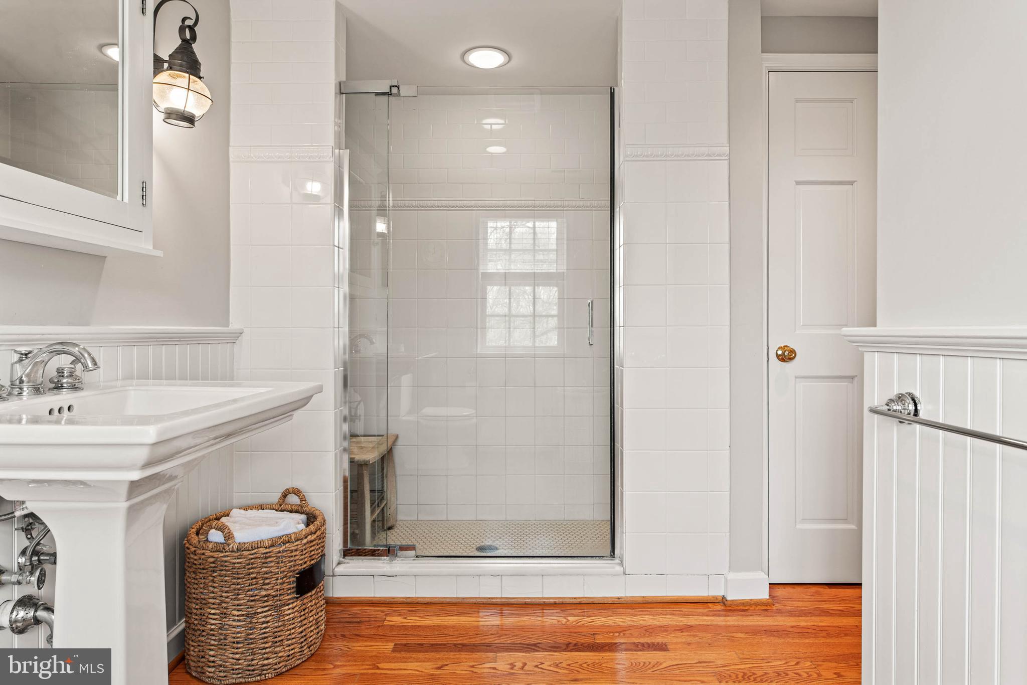 8 Rabbit Run Road Malvern, PA 19355 - Photo 33 of 49 a bathroom with a sink and a mirror