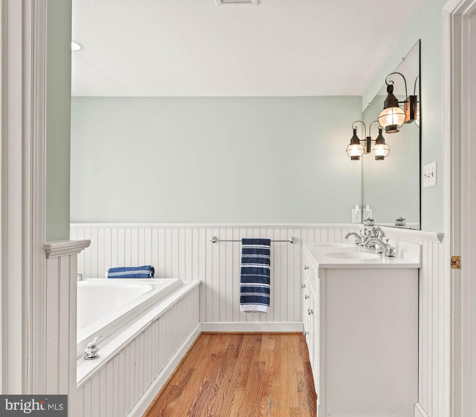 8 Rabbit Run Road Malvern, PA 19355 - Photo 38 of 49 a spacious bathroom with a bathtub and a shower