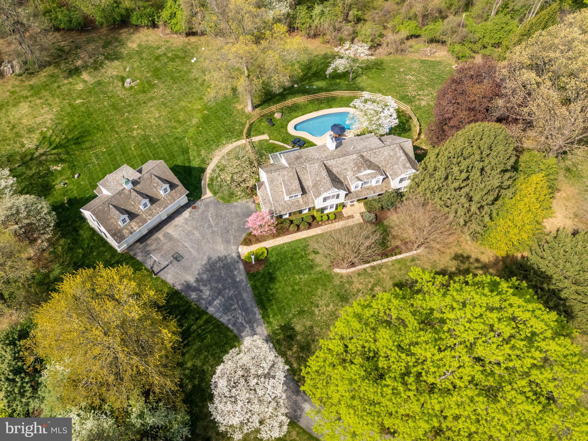 8 Rabbit Run Road Malvern, PA 19355 - Photo 48 of 49 an aerial view of a house with a yard and lake view