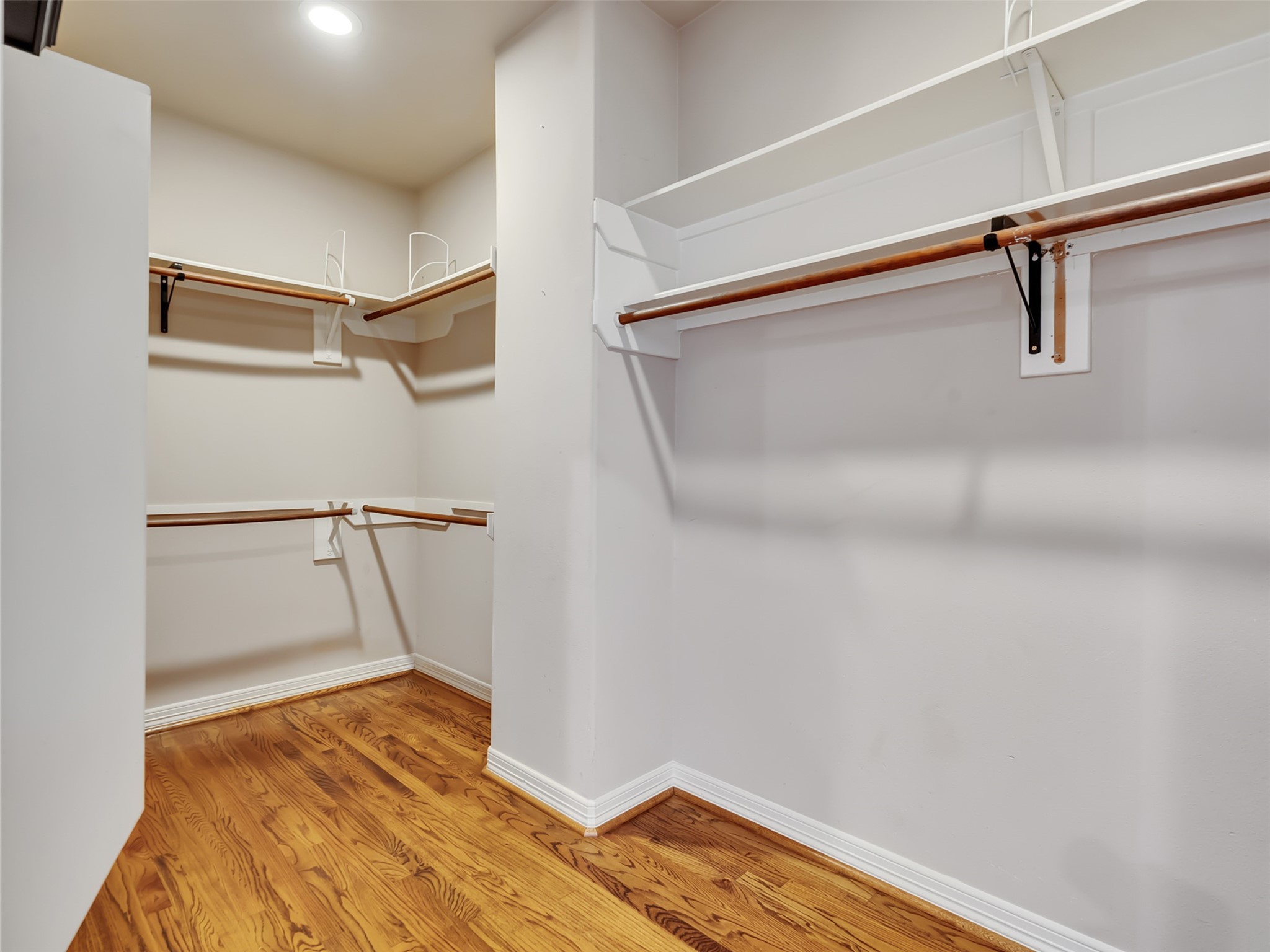2540 Prospect Street, Unit B Houston, TX 77004 - Photo 24 of 37 a view of walk in closet with empty racks