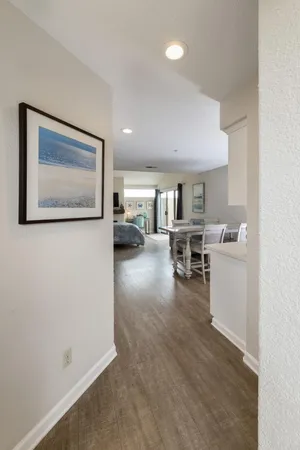 a view of a living room and dining room