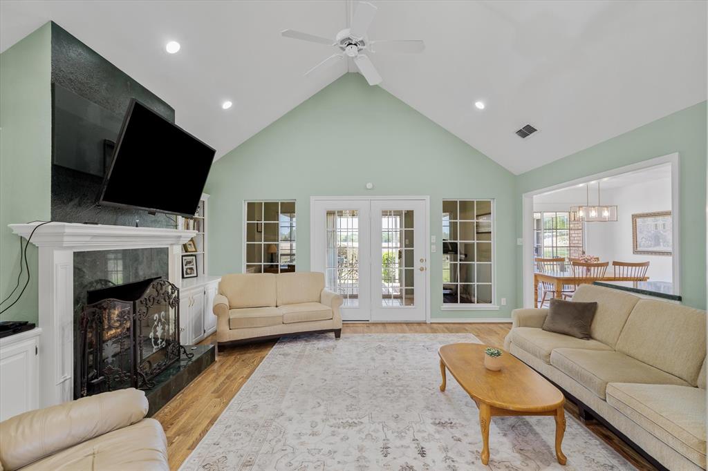 271 VZ County Road Canton, TX 75103 - Photo 10 of 40 a living room with furniture a fireplace and a flat screen tv