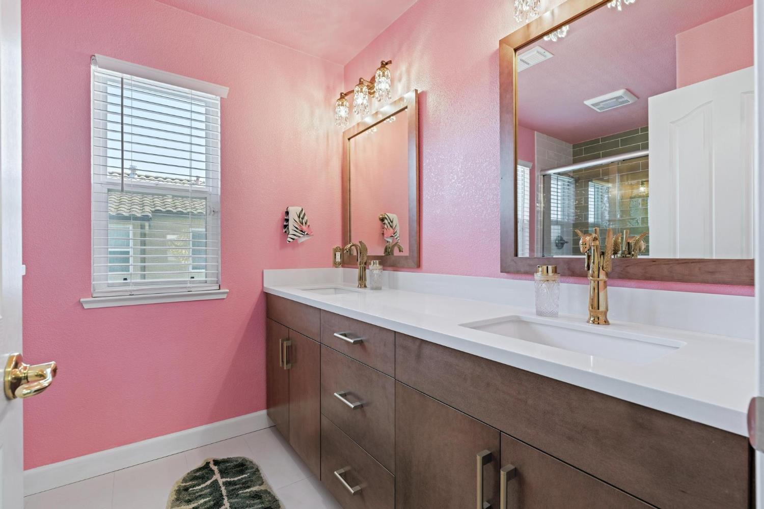 426 South Highland Avenue Ripon, CA 95366 - Photo 68 of 82 a bathroom with a sink a vanity and a mirror