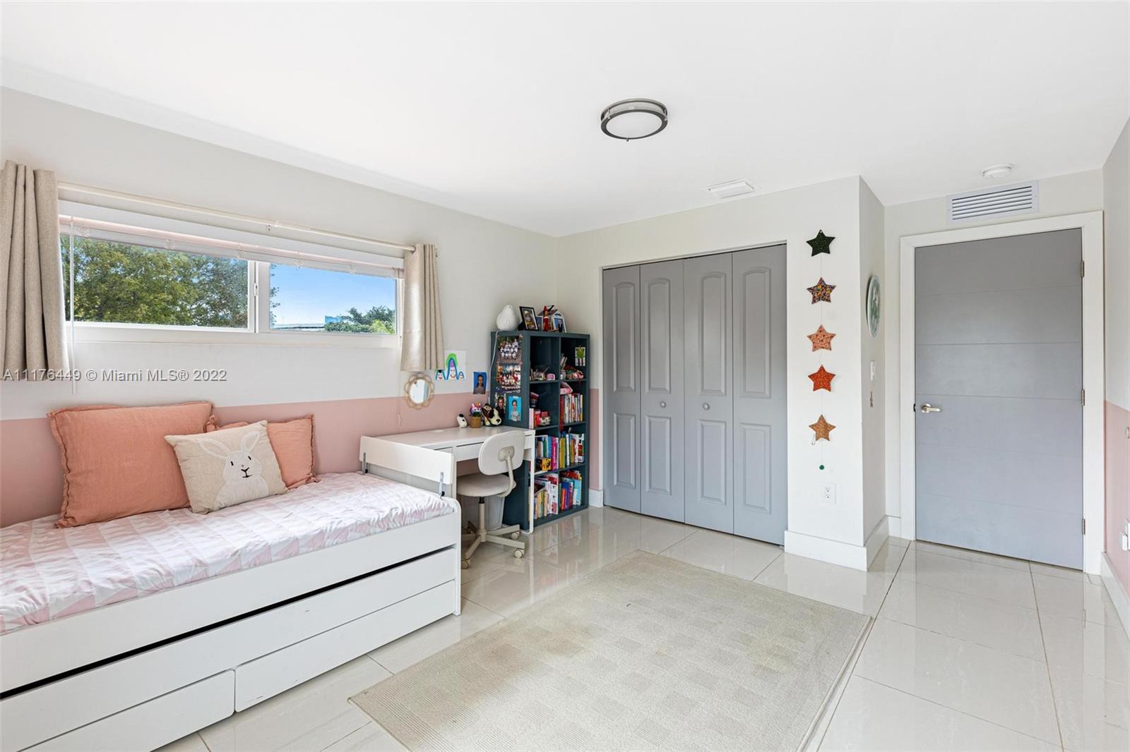 1910 Coral Gate Drive Miami, FL 33145 - Photo 19 of 39 a living room with furniture and a large window