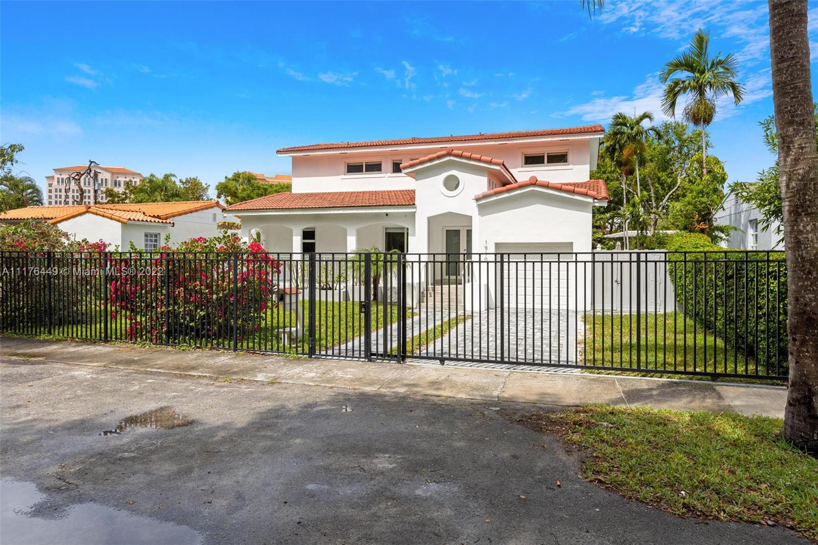 1910 Coral Gate Drive Miami, FL 33145 - Photo 33 of 39 a view of a house with a balcony