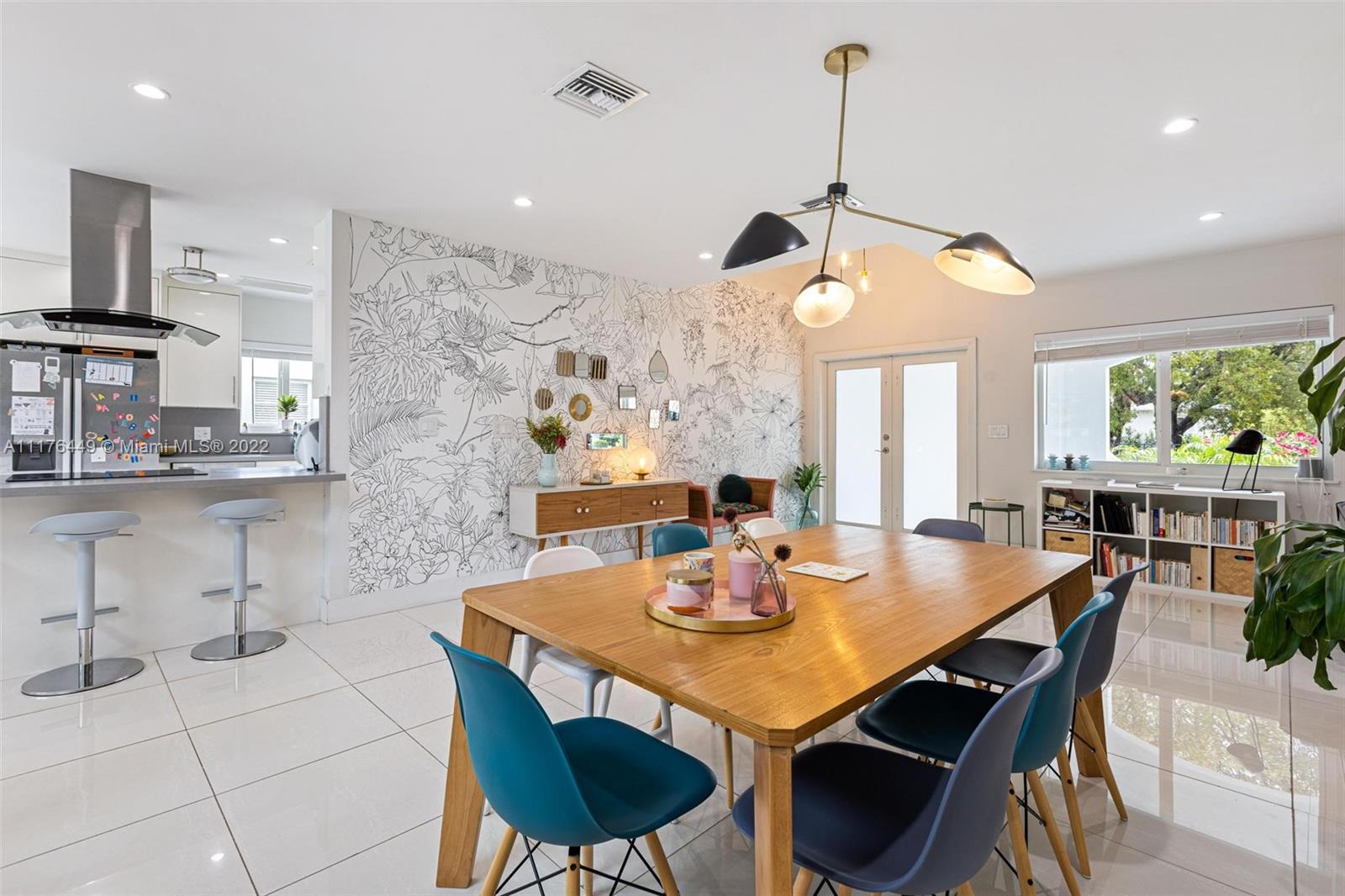 1910 Coral Gate Drive Miami, FL 33145 - Photo 6 of 39 a dining room filled chandelier and wooden furniture