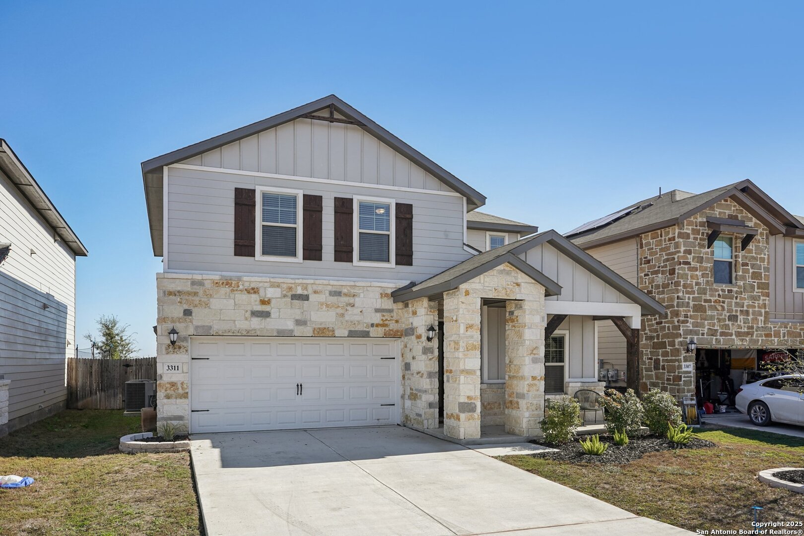3311 Junction Bay Converse, TX 78109 - Photo 2 of 50 a front view of a house with a garden