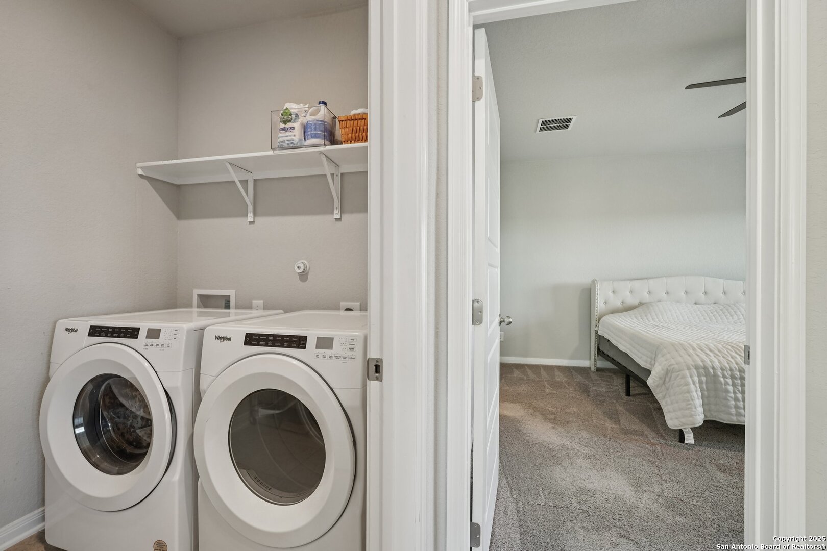 3311 Junction Bay Converse, TX 78109 - Photo 24 of 50 a view of a bedroom with washer and dryer