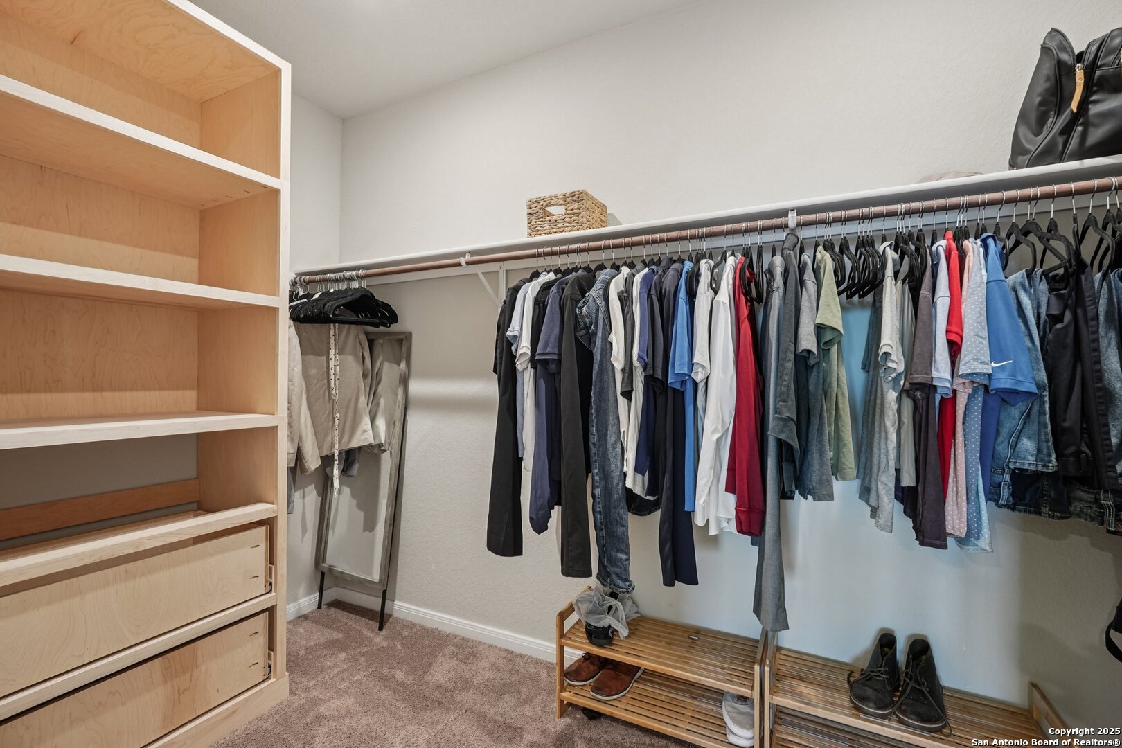 3311 Junction Bay Converse, TX 78109 - Photo 33 of 50 a view of walk in closet with clothes and shoes