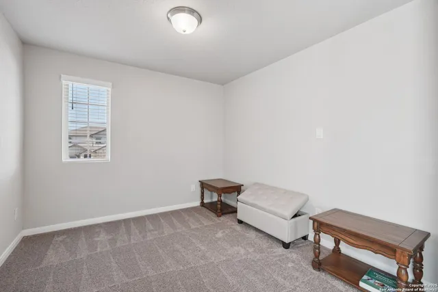 a view of livingroom with furniture and fireplace