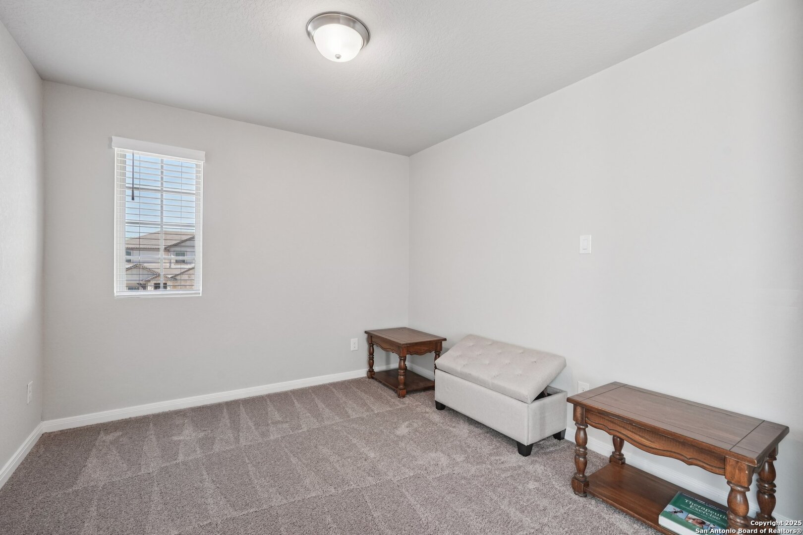 3311 Junction Bay Converse, TX 78109 - Photo 38 of 50 a living room with furniture and a window