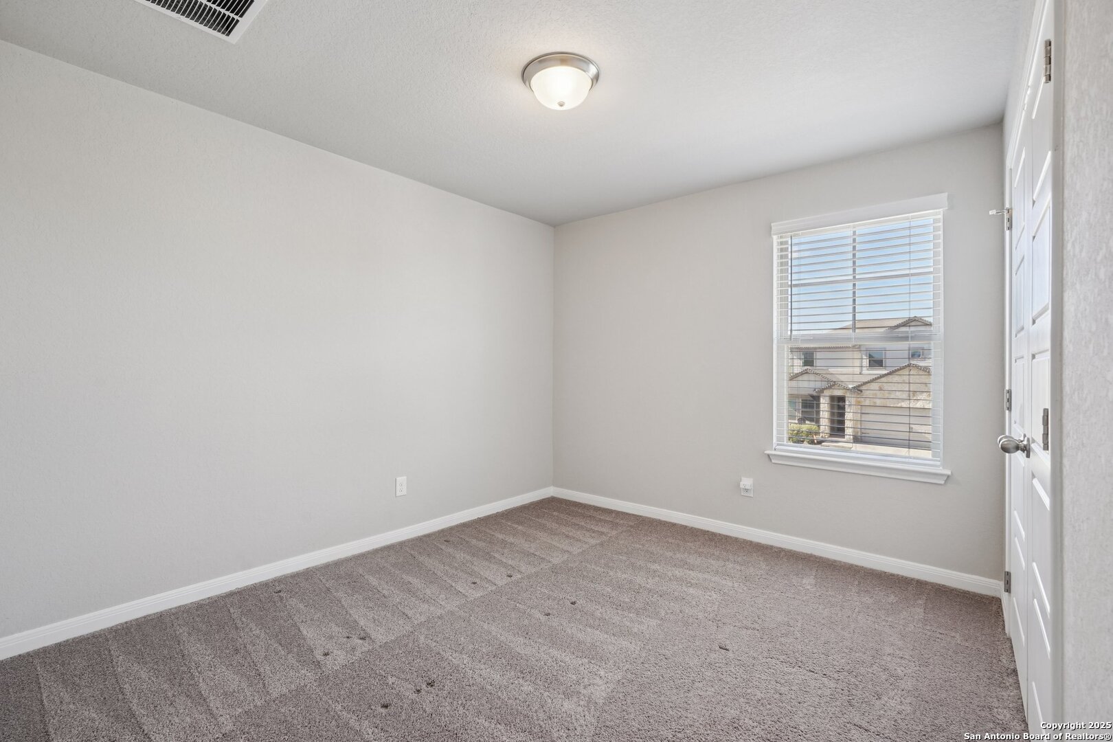 3311 Junction Bay Converse, TX 78109 - Photo 45 of 50 an empty room with a window