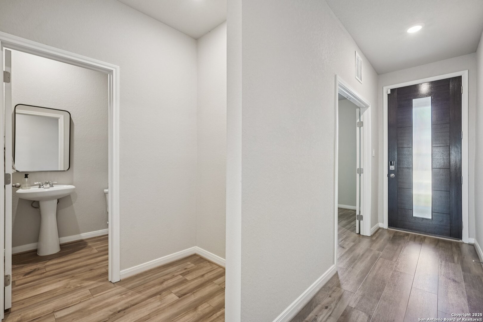 3311 Junction Bay Converse, TX 78109 - Photo 6 of 50 a view of a bathroom from the hallway