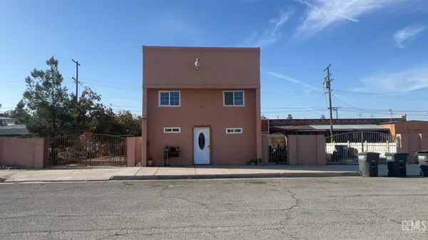 a view of a house with a street