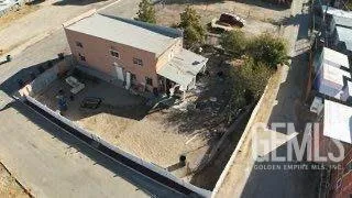 a view of swimming pool from a balcony