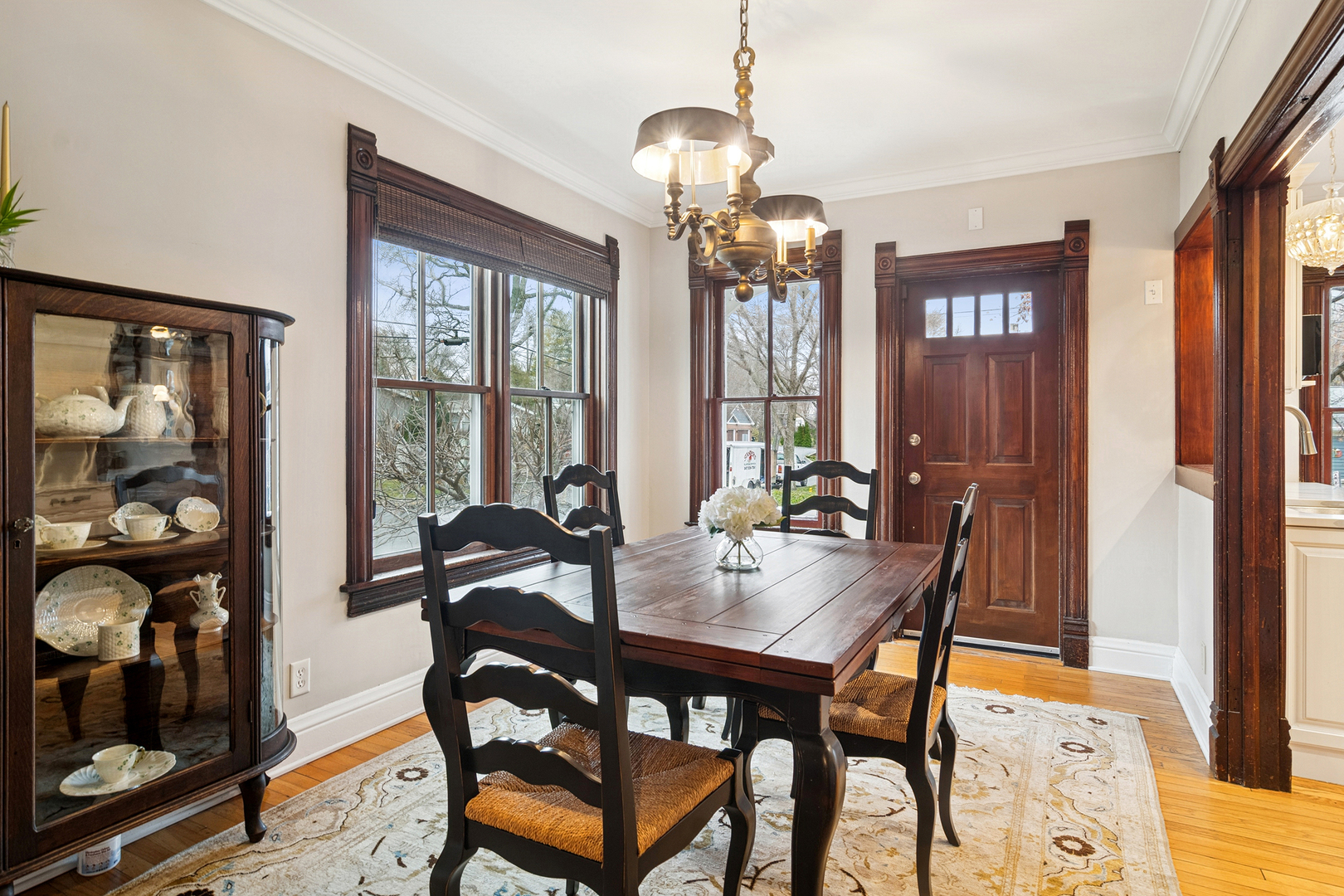 202 East Hillside Road Barrington, IL 60010 - Photo 11 of 37 a view of a dining room with furniture and chandelier