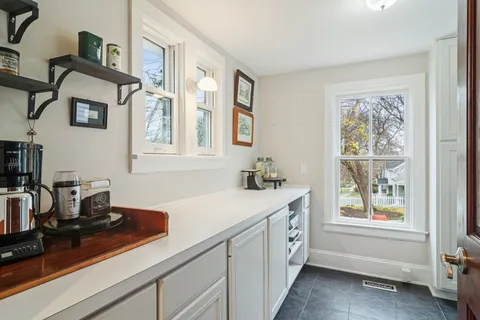 a kitchen with cabinets a window and a sink