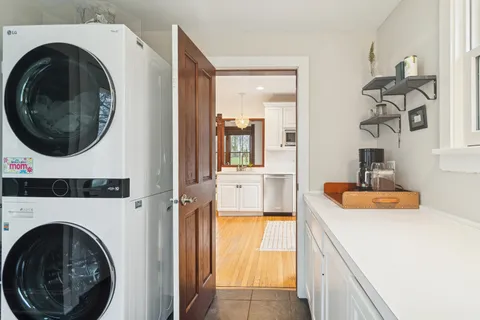 a view of a kitchen with washer and dryer