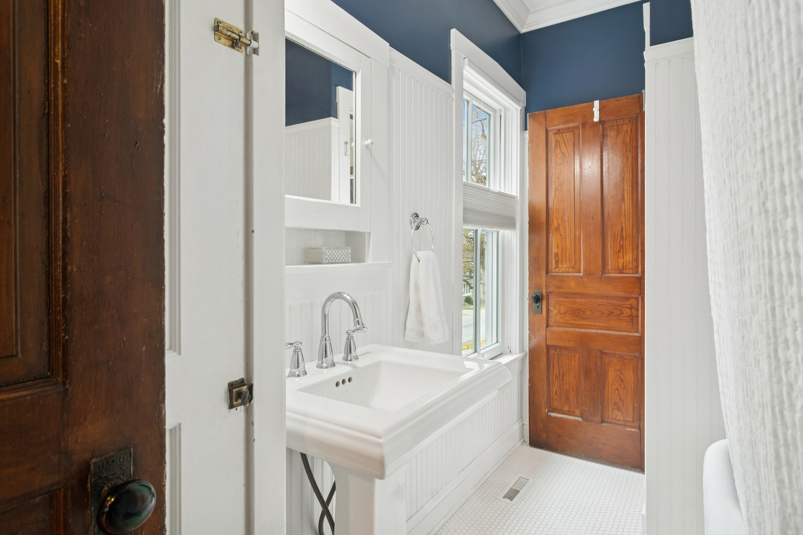 202 East Hillside Road Barrington, IL 60010 - Photo 19 of 37 a bathroom with a sink and mirror