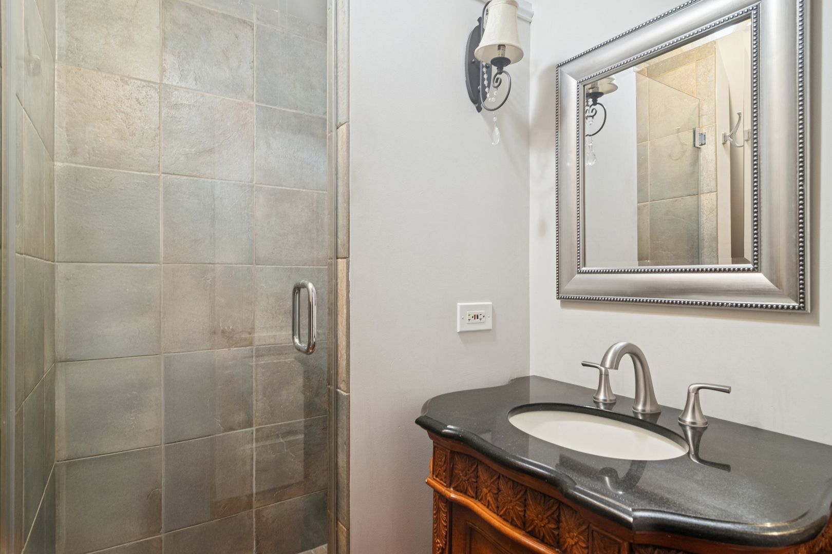 202 East Hillside Road Barrington, IL 60010 - Photo 23 of 37 a bathroom with a granite countertop sink a mirror and a shower