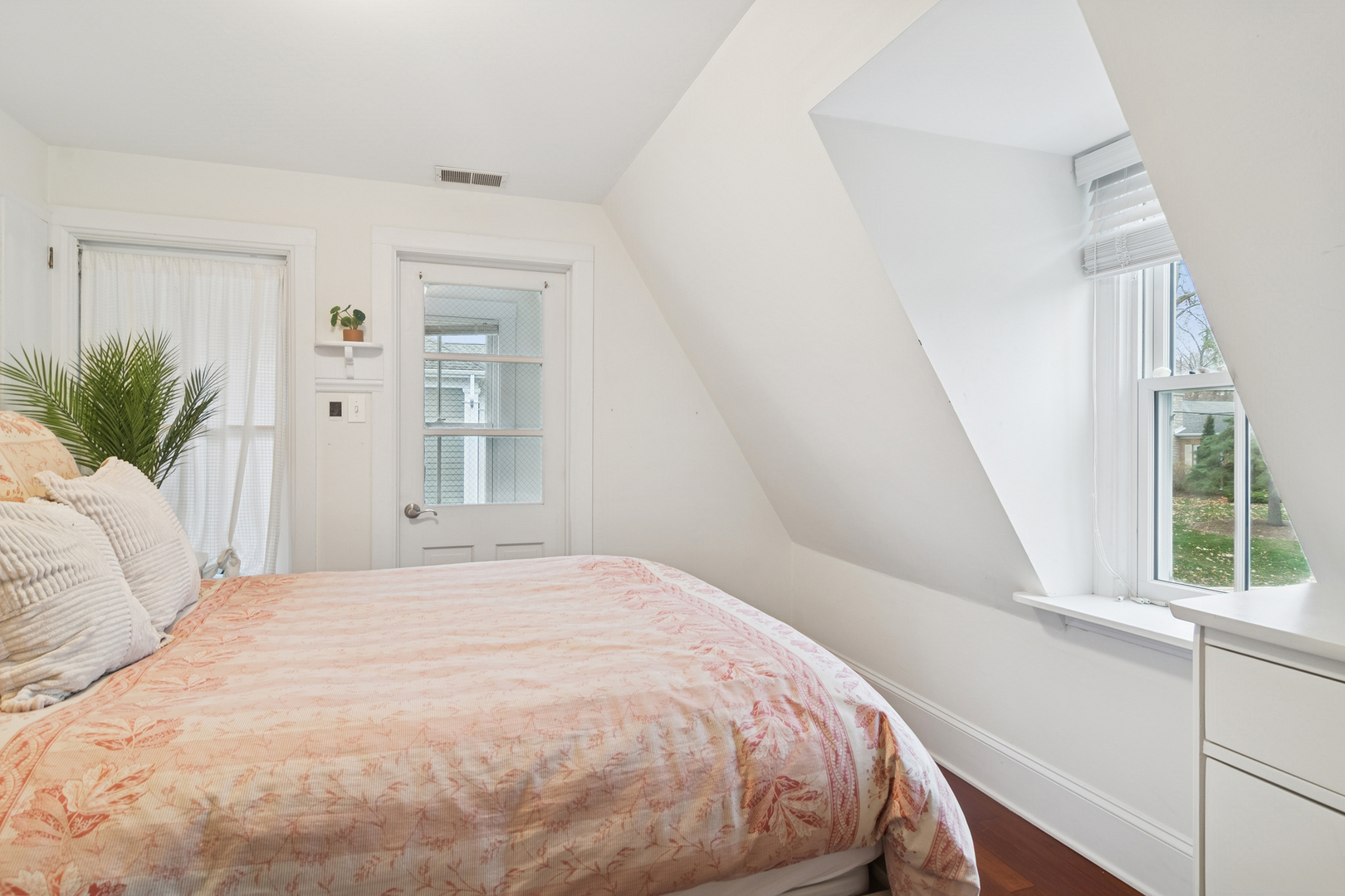 202 East Hillside Road Barrington, IL 60010 - Photo 24 of 37 a bedroom with a bed and a large window