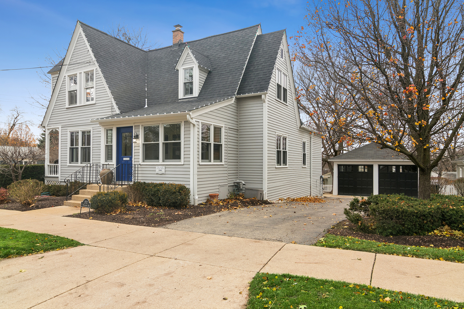 202 East Hillside Road Barrington, IL 60010 - Photo 32 of 37 a front view of a house with garden
