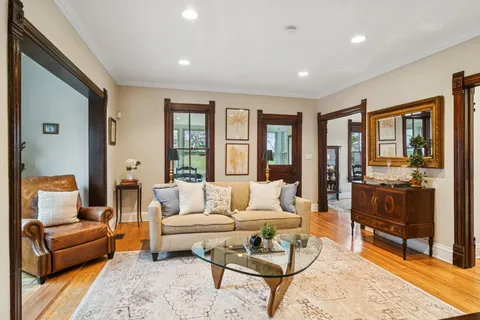a living room with furniture and a table
