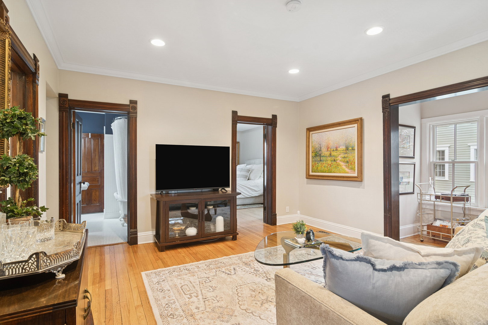 202 East Hillside Road Barrington, IL 60010 - Photo 5 of 37 a living room with furniture and a flat screen tv