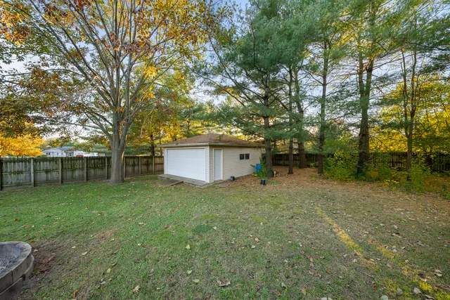 a house with trees in front of it