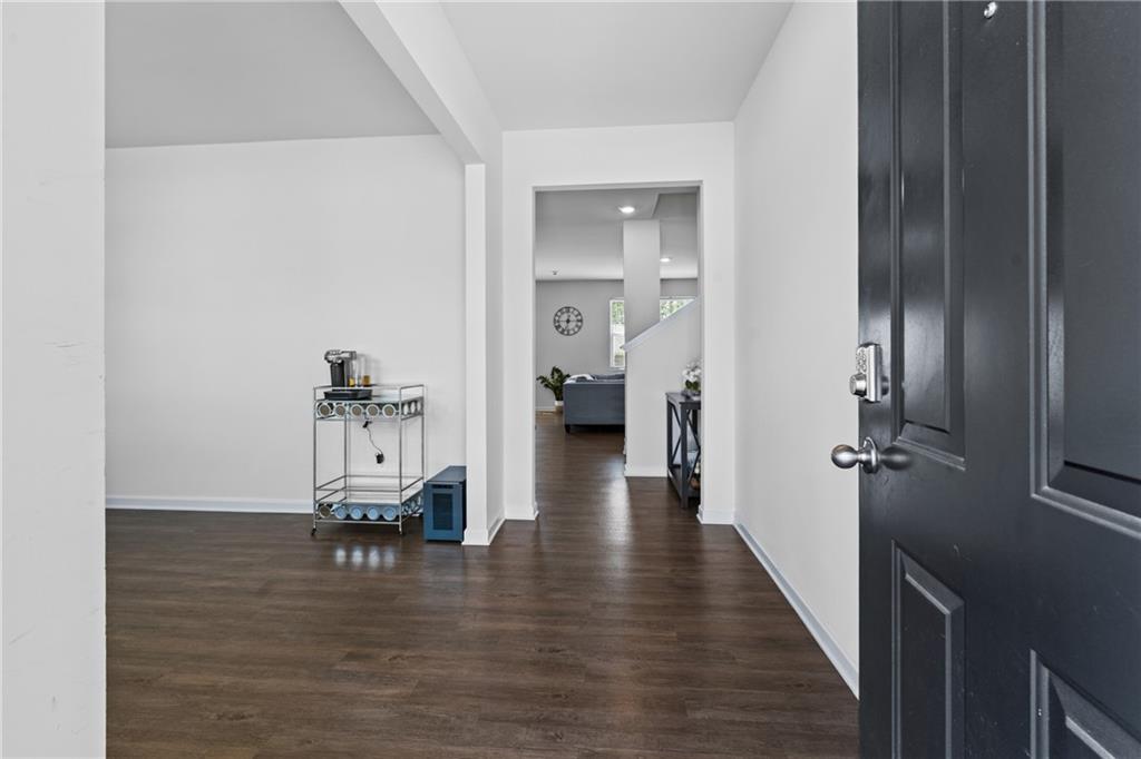 5367 Pennington Court Atlanta, GA 30349 - Photo 2 of 33 a view of dining room with wooden floor