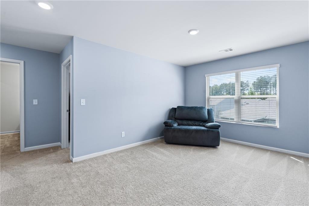 5367 Pennington Court Atlanta, GA 30349 - Photo 22 of 33 an empty room with windows