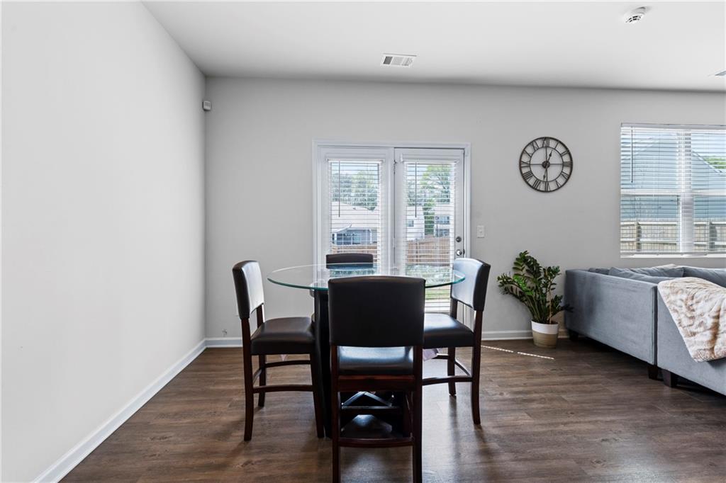 5367 Pennington Court Atlanta, GA 30349 - Photo 7 of 33 a dining room with furniture and a window