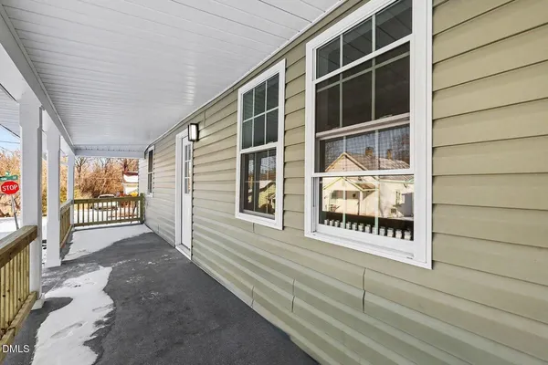 a view of front door and porch