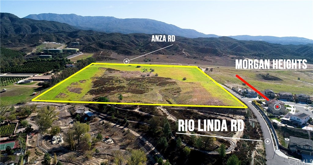a view of swimming pool with a table and chairs