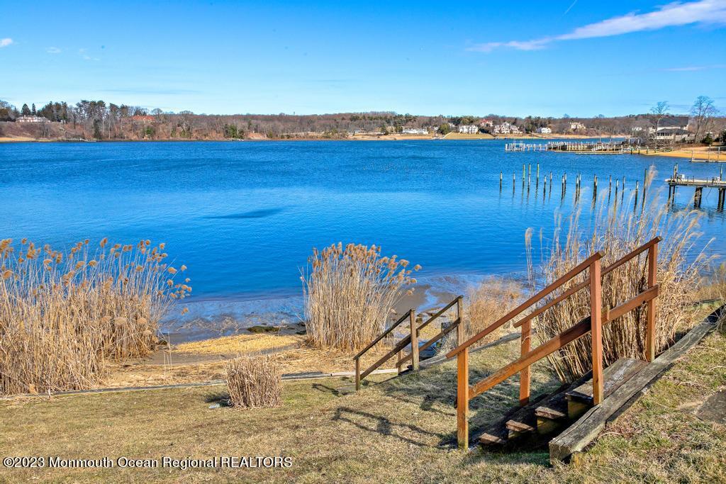 29 Hance Road Fair Haven, NJ 07704 - Photo 1 of 53 a view of a terrace with wooden floor and a lake view