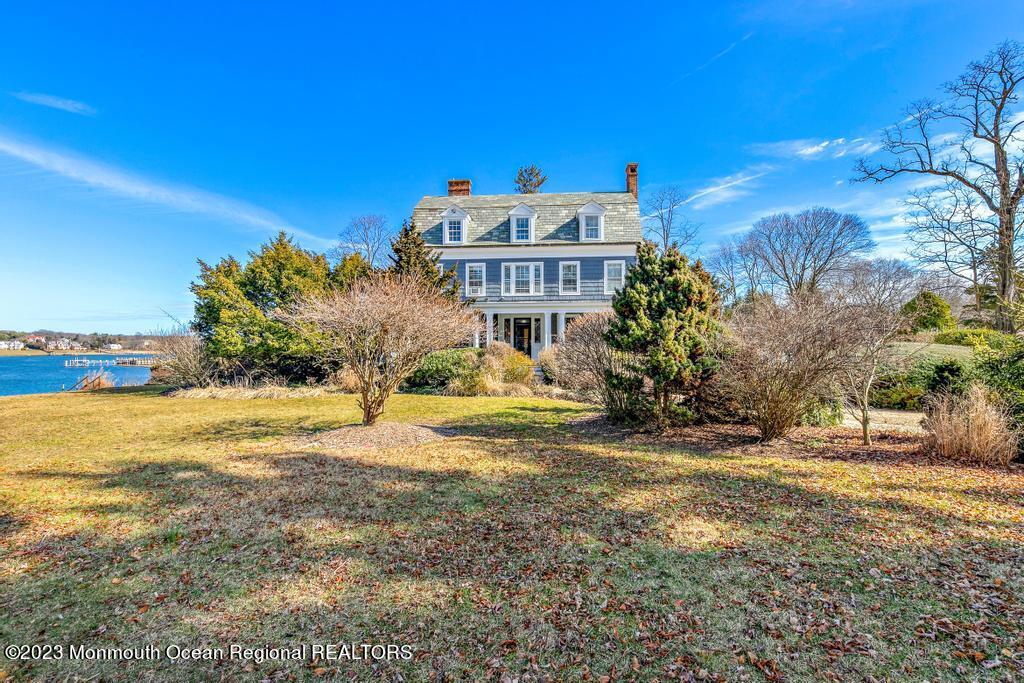 29 Hance Road Fair Haven, NJ 07704 - Photo 16 of 53 a view of a house with a yard and a large tree