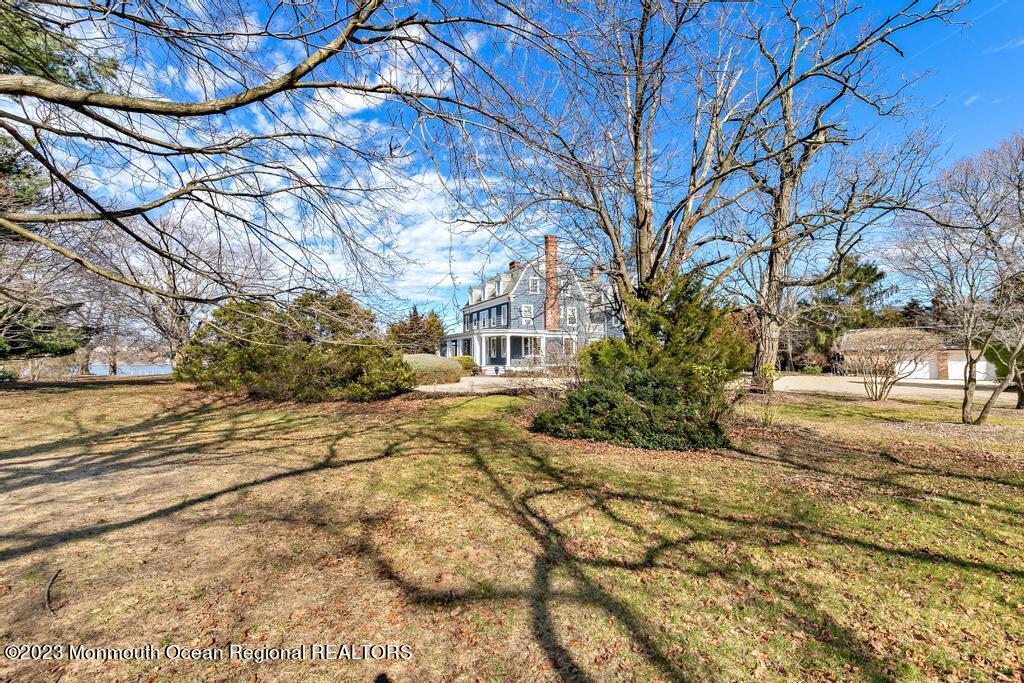 29 Hance Road Fair Haven, NJ 07704 - Photo 23 of 53 a view of a yard with plants and trees
