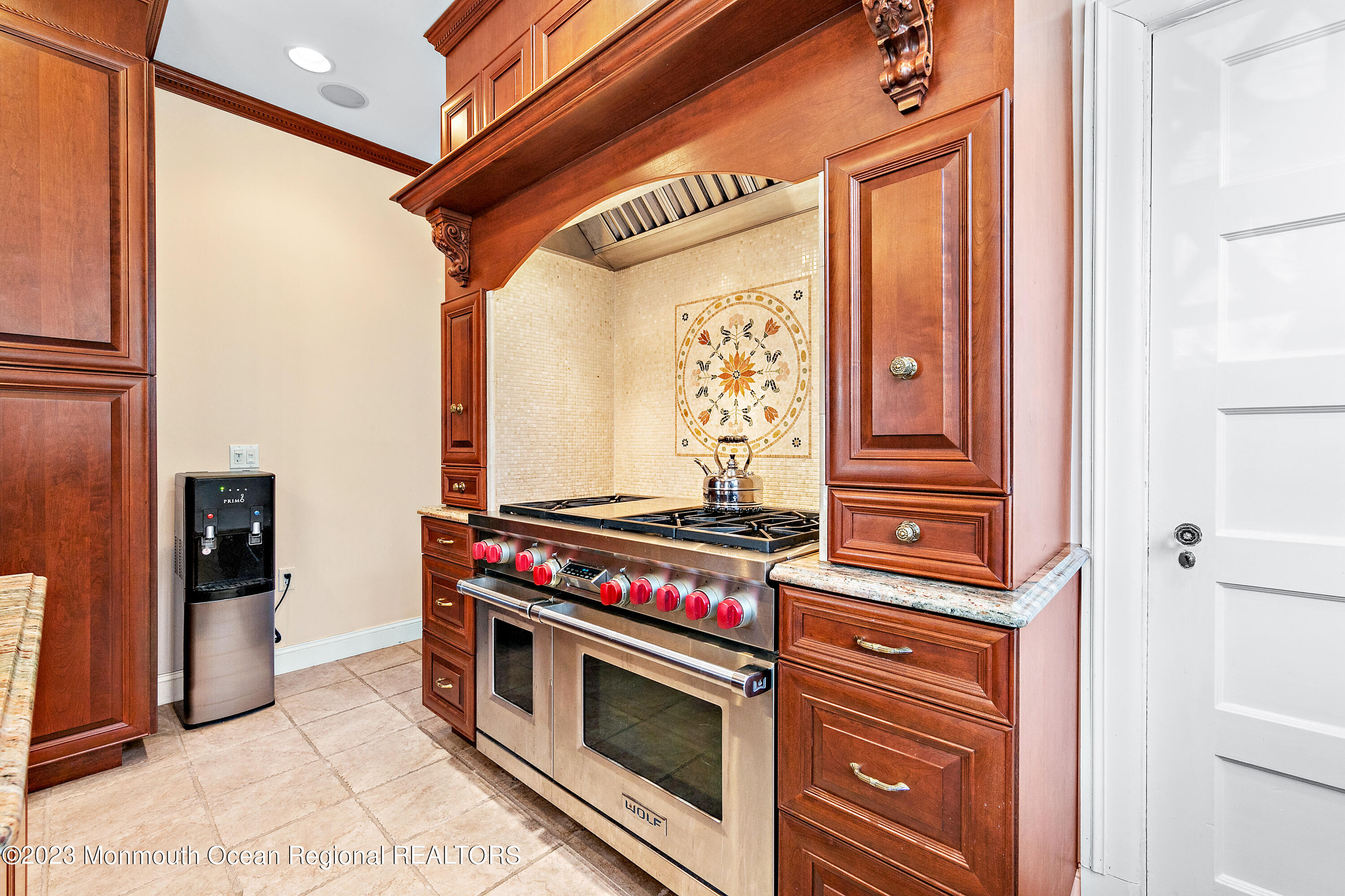 29 Hance Road Fair Haven, NJ 07704 - Photo 41 of 53 a kitchen with stainless steel appliances granite countertop a stove and a refrigerator