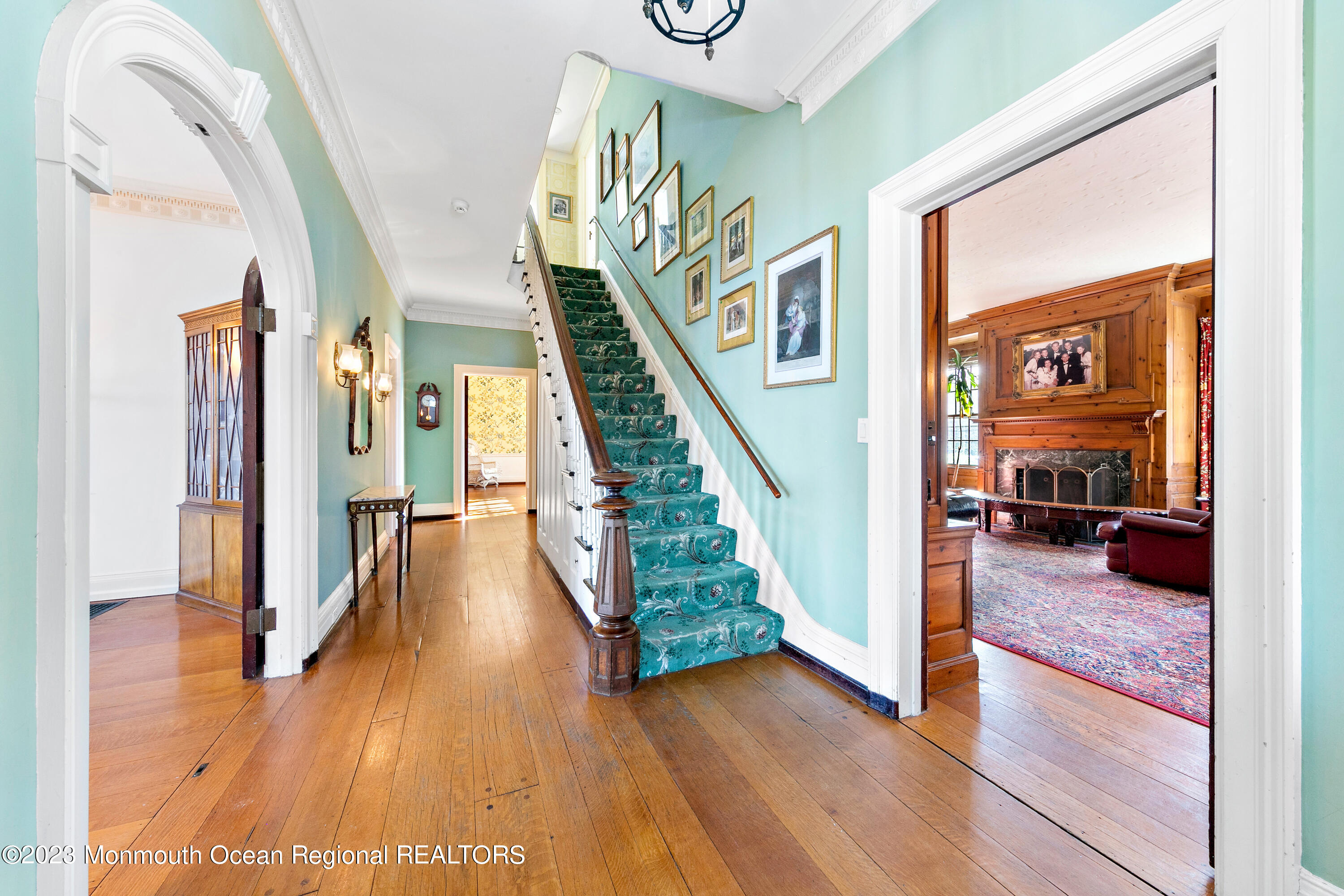 29 Hance Road Fair Haven, NJ 07704 - Photo 7 of 53 a view of a hallway view with wooden floor and staircase