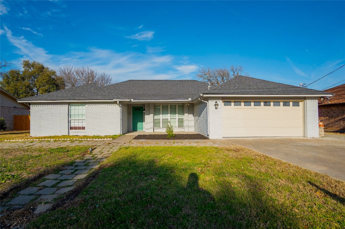 3207 Broken Spoke Trail Georgetown, TX 78628 - Photo 1 of 34 a view of a house with pool and a yard