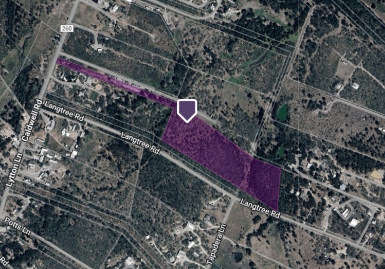 211 Caldwell Road Dale, TX 78616 - Photo 9 of 27 a street sign that is on a brick wall