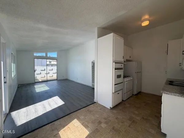 a view of kitchen and utility room