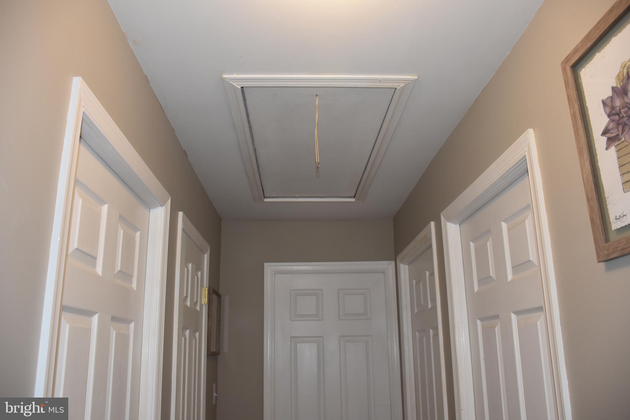 824 Dunbury Road Fairless Hills, PA 19030 - Photo 30 of 31 Pull down stairs to access attic