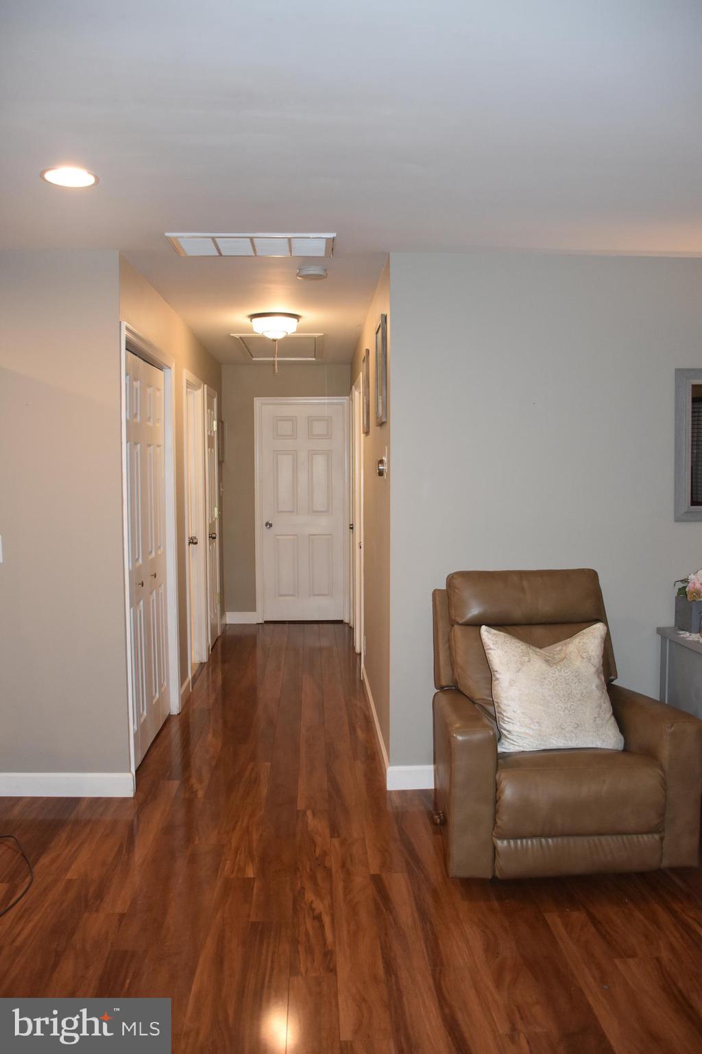 824 Dunbury Road Fairless Hills, PA 19030 - Photo 31 of 31 Hardwood floors in main area and hallway