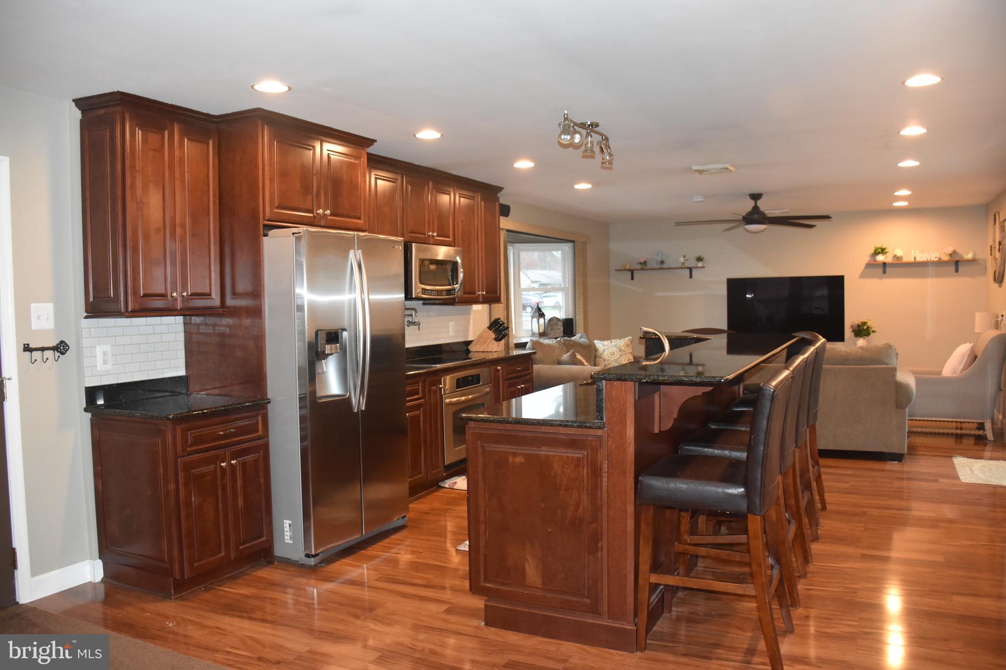 824 Dunbury Road Fairless Hills, PA 19030 - Photo 8 of 31 Kitchen with island and bar area