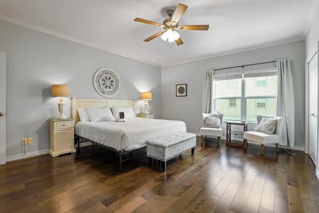 a view of a hallway with entryway and stairs