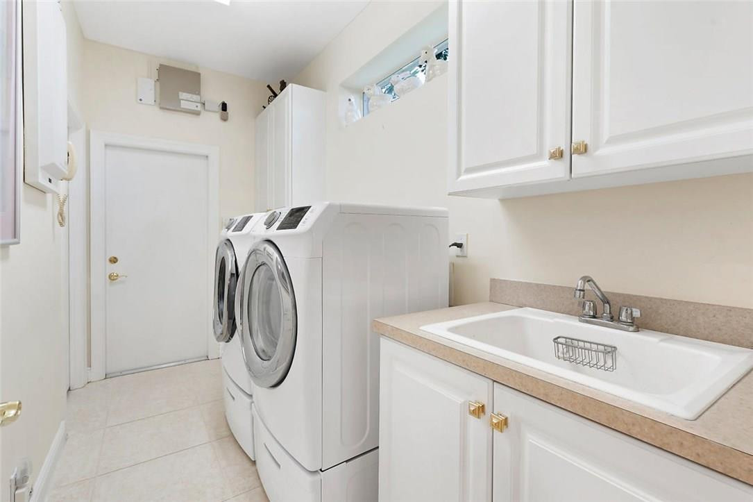 16391 Braeburn Ridge Trail Delray Beach, FL 33446 - Photo 22 of 31 Laundry Room with brand new washer/dryer