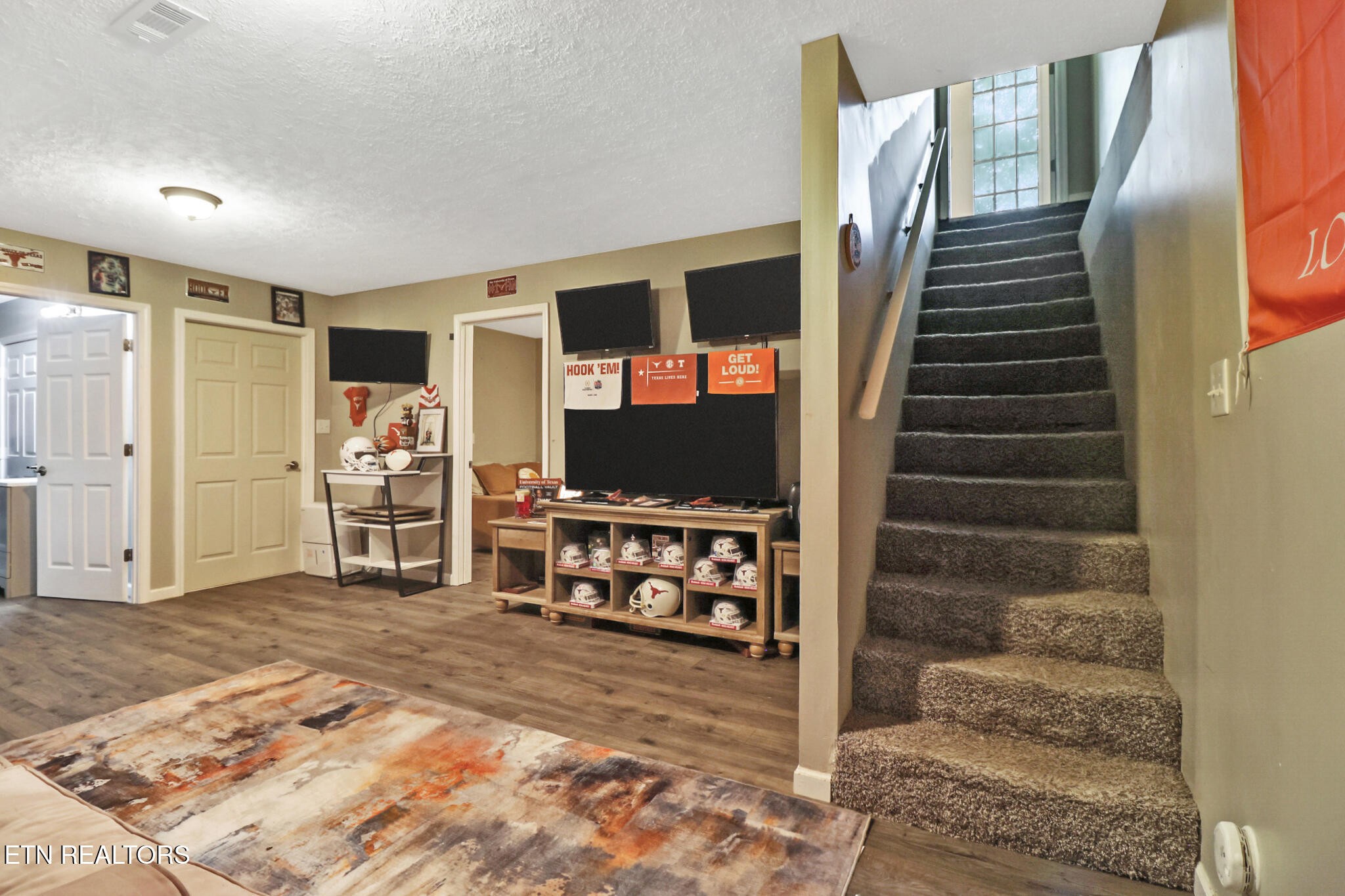 604 Bear Cub Lane Clinton, TN 37716 - Photo 17 of 23 a view of a livingroom with wooden floor and windows